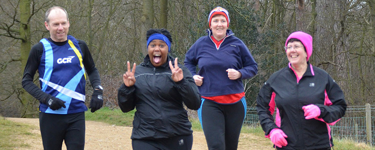 Four runners at Panshanger parkrun